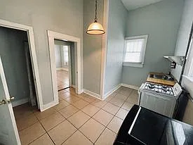 219 E 3rd St — Photo 9