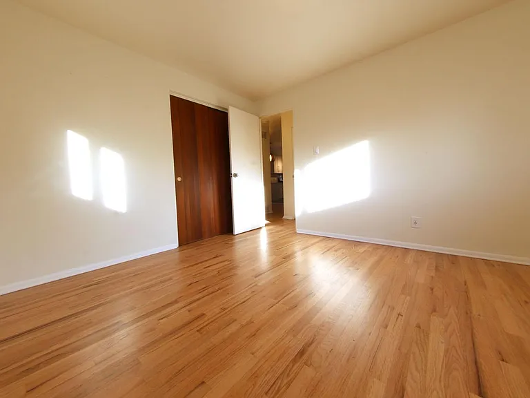 Upstairs Master Bedroom- Looking towards dining room and kitchen.