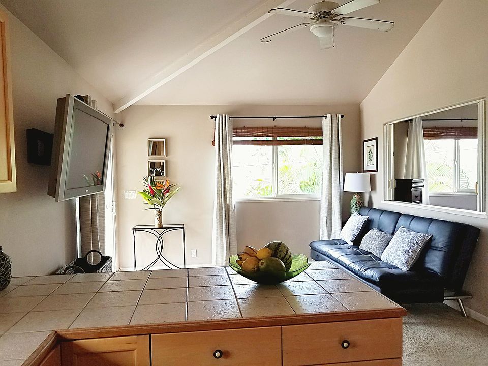 Big open floor plan with high vaulted ceilings.