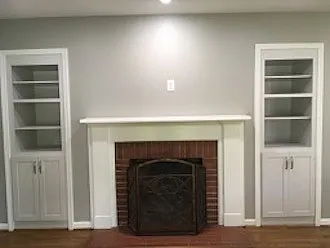 Den with bookcases.