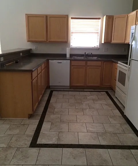 Kitchen, fridge is 2 years old, flattop stove & oven, microwave, dishwasher, disposal.