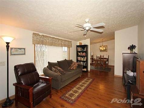 Beautiful new flooring makes caring for your home easy.  Ceiling fans help conserve energy and make the home a cozy place to live.