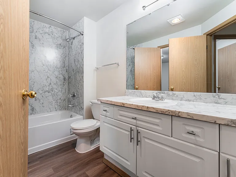 Stylish bathrooms with updated finishes.