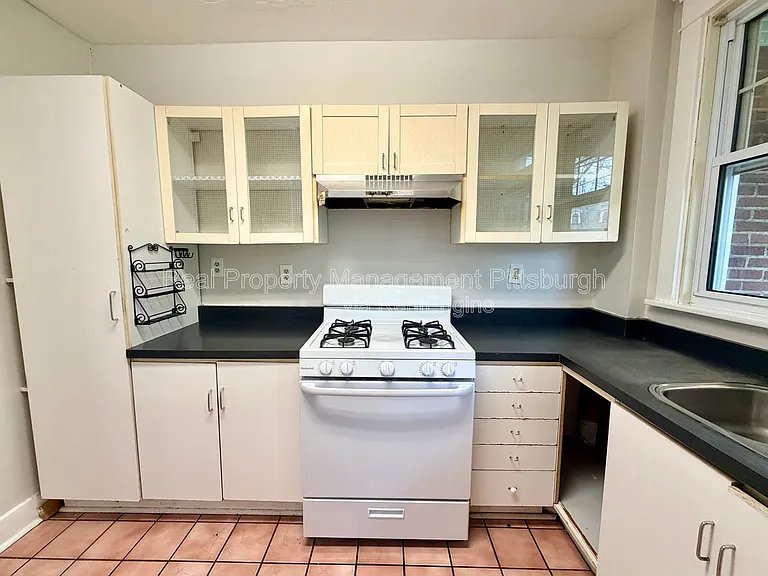 5550 Wilkins Ave — Photo 8