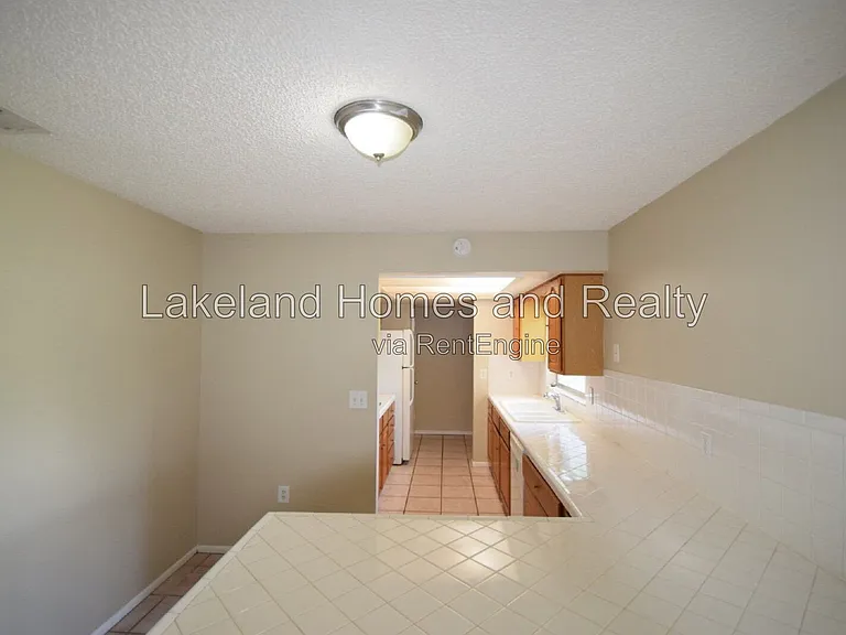 1204 Honeytree Ln W — Photo 38