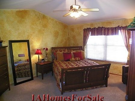 Master Bedroom: Vaulted ceiling, custom wood blinds, His & Hers walk in closets, new carpet Sept 2012