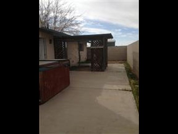 Side patio off master bedroom