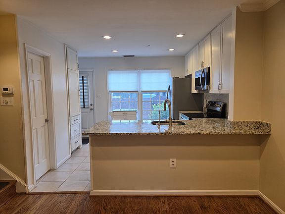 Open kitchen with granite counter
