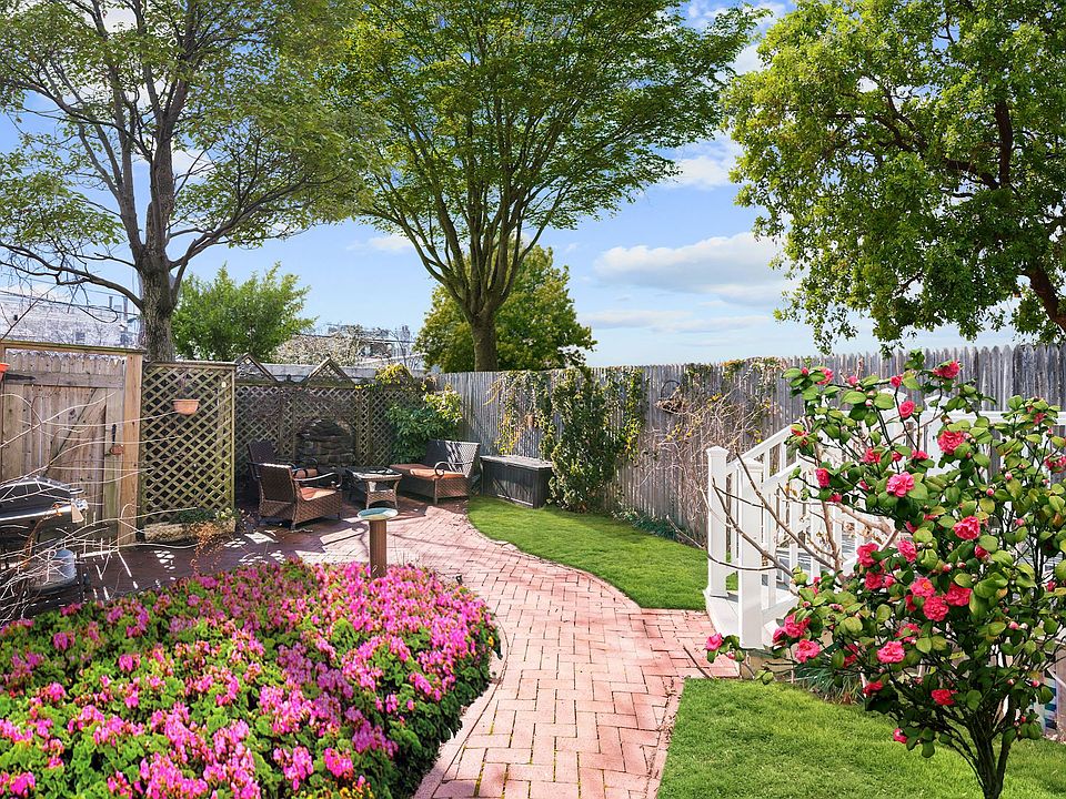 Spectacular Rear Yard with Grill & Seating Area