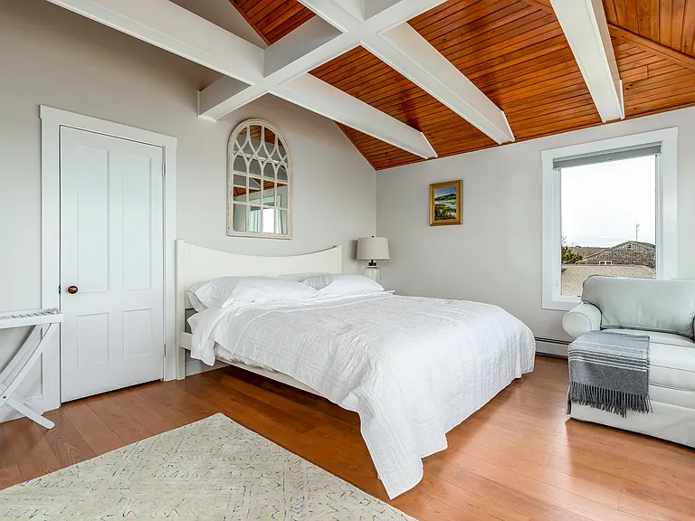 The third floor master bedroom with a king bed. Panoramic ocean views.