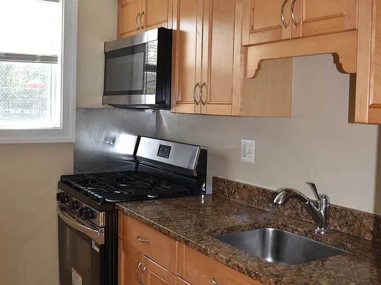 Kitchen with Gas Stove and Dish Washer
