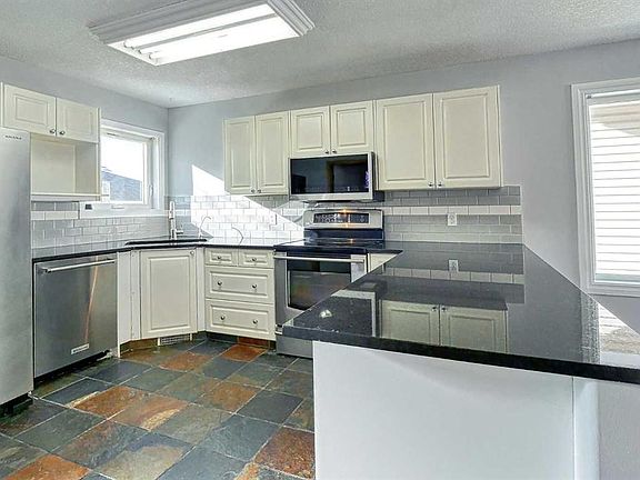 4th image of 136 N Chaparral Ridge Cir SE