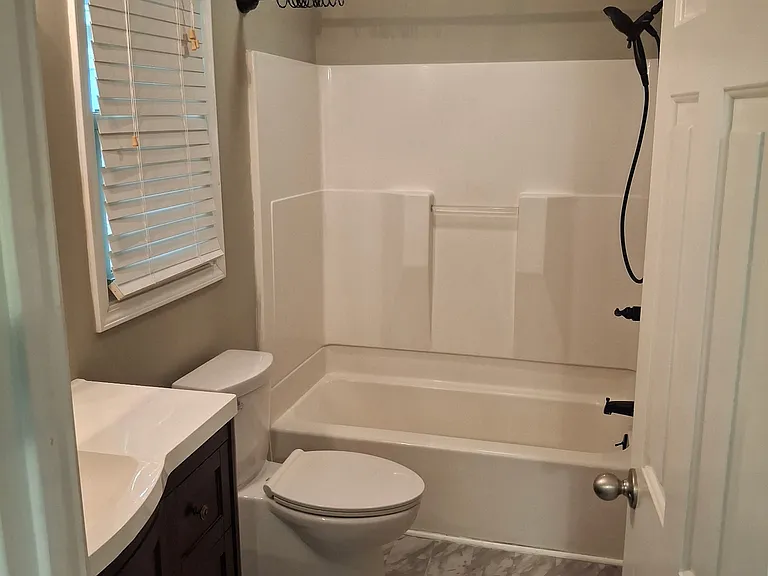 Master Bath (sink, toilet, tub/shower)