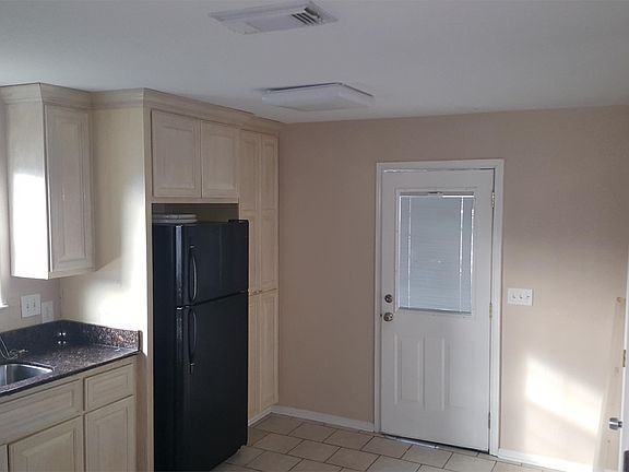 Refrigerator, stove and dishwasher included.