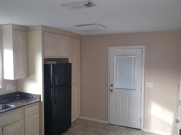 Refrigerator, stove and dishwasher included.
