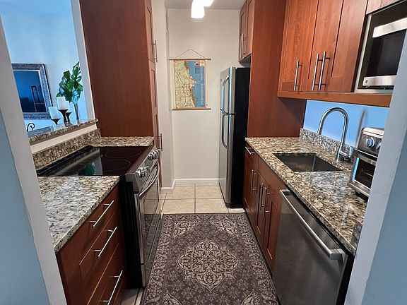 View of kitchen from entry way