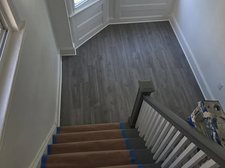 Secluded foyer area downstairs which leads up to the apartment.