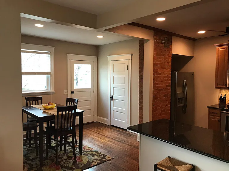 Eat in Kitchen with exposed brick