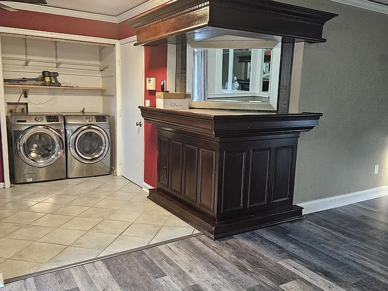 View from main living area into kitchen/bar area.