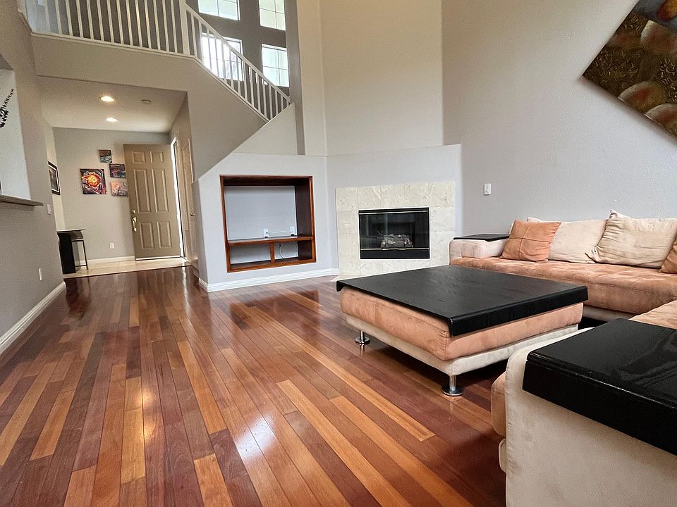 Vaulted Ceiling, real hardwood flooring.