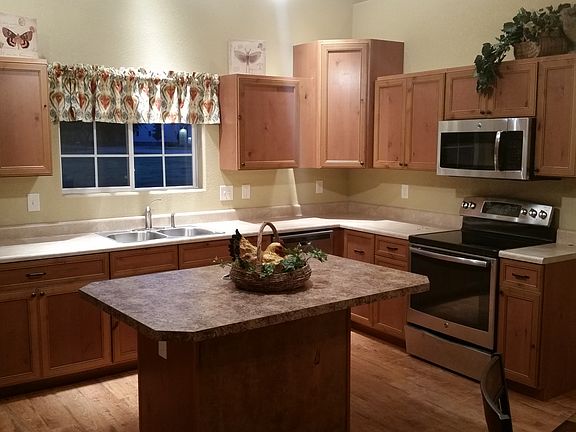 Rustic Alder cabinets/ Islan