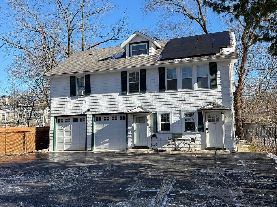 Quaint carriage house down a quiet driveway. You'll be the top apartment up the stairs.