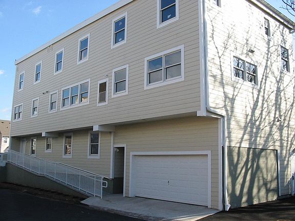 Side view of building towards Bloomfield Avenue. Apt A is on 1st floor accessed via ramp and stairs at second entrance.