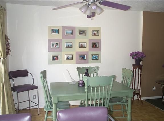 Dining with pergo floors & ceiling fan