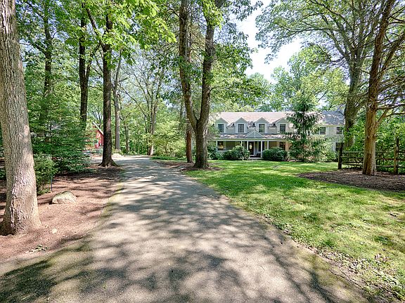 Driveway View of Farmhouse