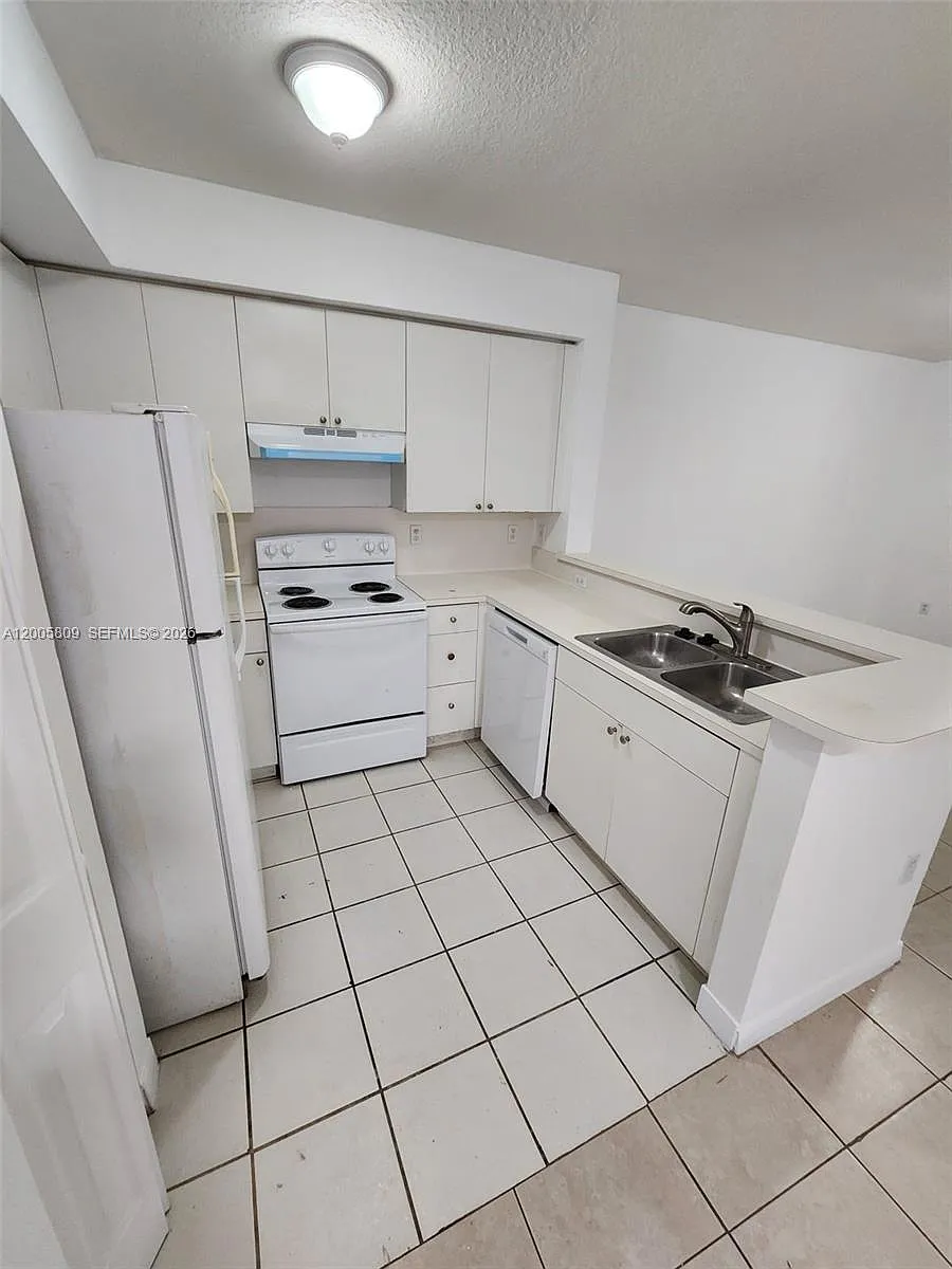 Building Photo - 11060 SW 196th St #209