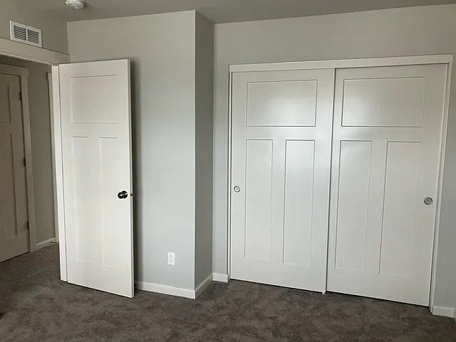Secondary Bedroom A's closet doors