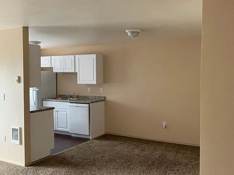 View of dinning room and kitchen area