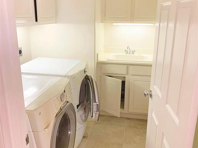 Laundry (1st floor) is right behind kitchen pantry