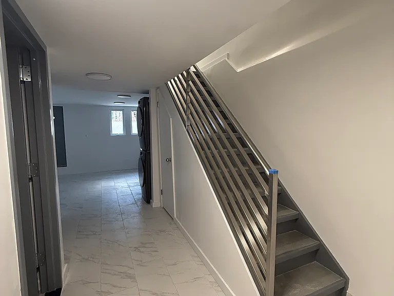 stairway to 1st floor/ lower level