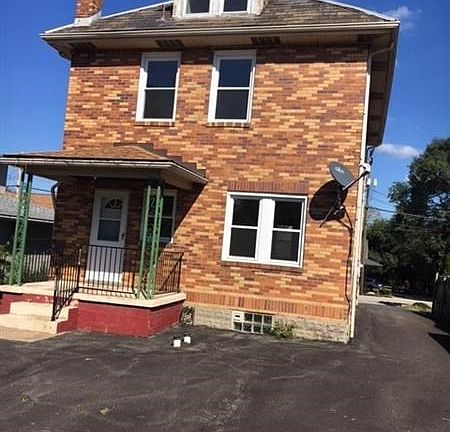Rear of home showing off street parking