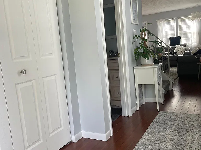 Large coat closet to left