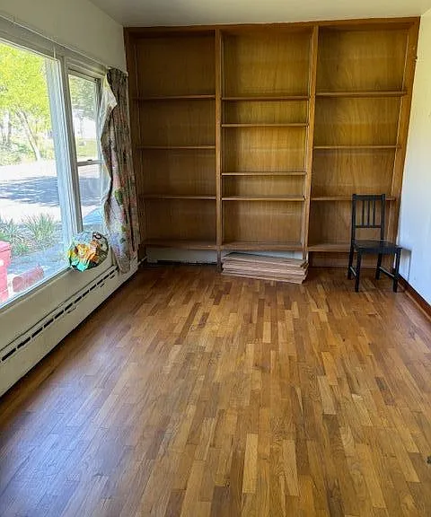 Bedroom with Built-In Bookshelf
