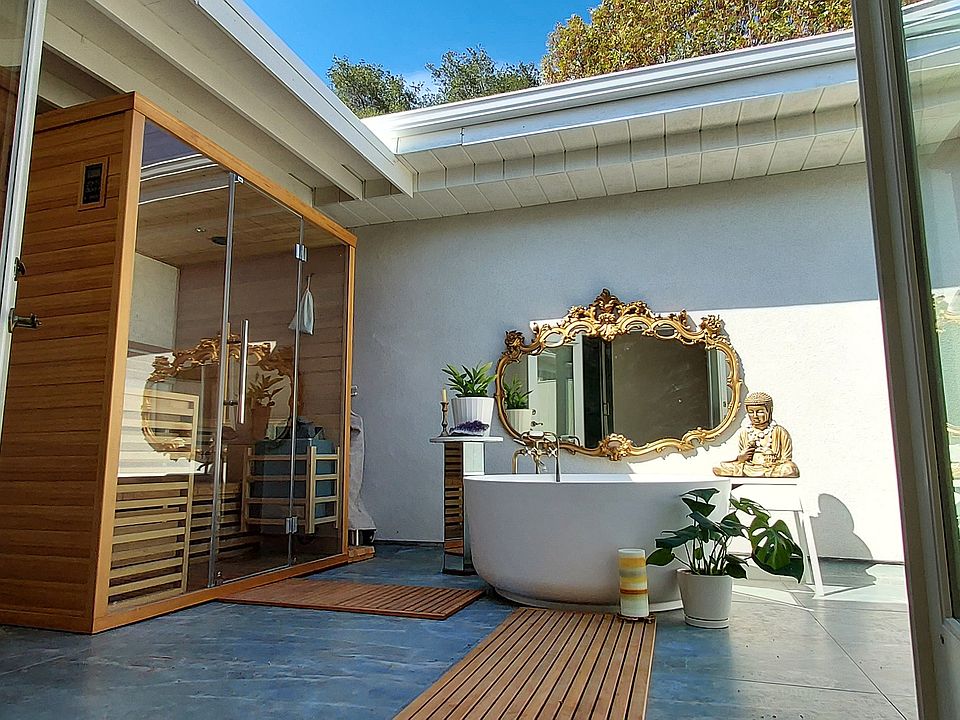 Your private spa courtyard awaits. Freestanding oversized bath tub for stargazing, or pull the shades closed for protection from the sun
