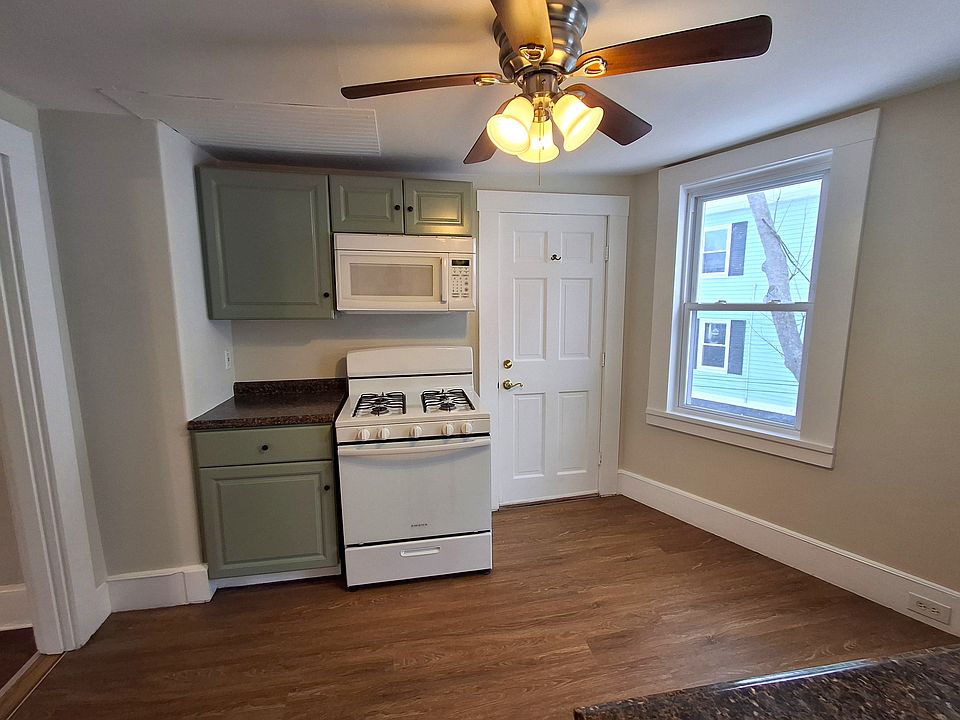 Kitchen: The door in this photo leads to the back stairs.