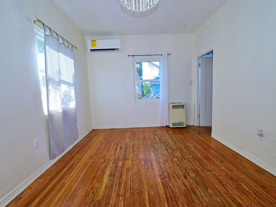 BRIGHT unit with high ceiling + NEW MINI SPLIT A/C, and CRYSTAL ceiling fans in living, and bedroom