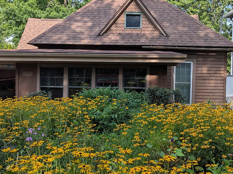 This is the owner's entrance (not the tenant's entrance). The rental apt. has a private entrance around the left side of the house. This is a duplex.