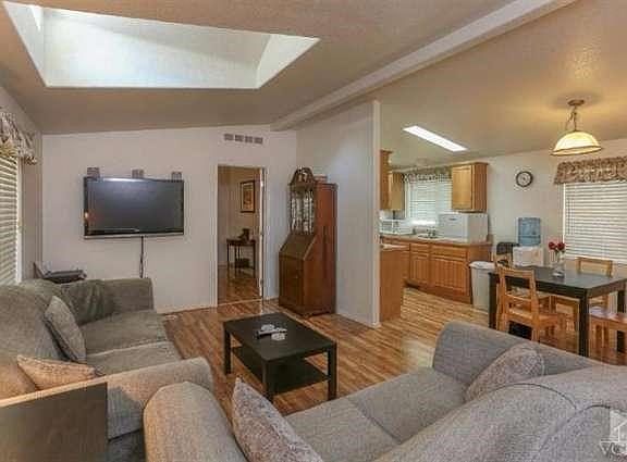 Skylight brings in natural light in the formal living room.
