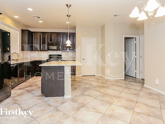 5th image of 10349 Yew Blossom Ave