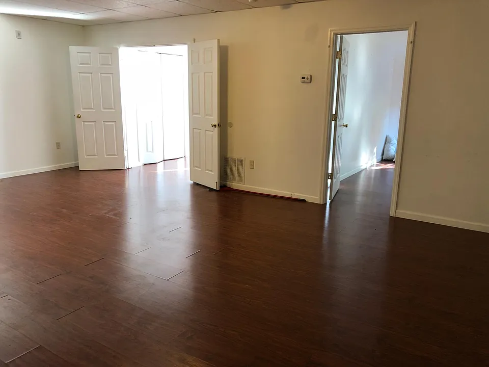 Living room looking over the door entrance two bedrooms