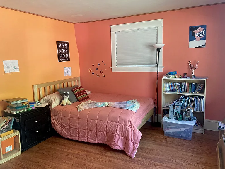Front bedroom. Paint has since been updated to a warm gray.