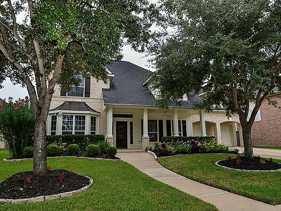 Beautiful landscaping in front and back yard.