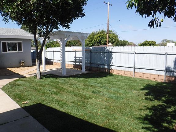 Back yard and gazebo. Notice privacy due to elevated corner lot.