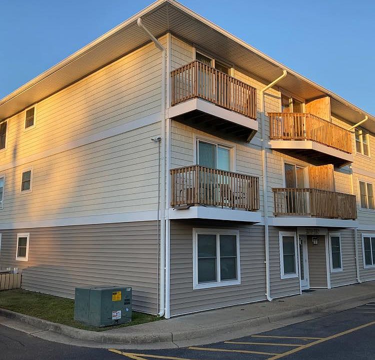 Newly renovated exterior with private decks on front and back.
