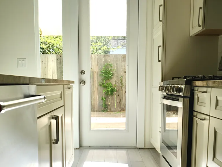 10' ceilings on the first floor with 8' tall doorways for lot's of natural lighting.