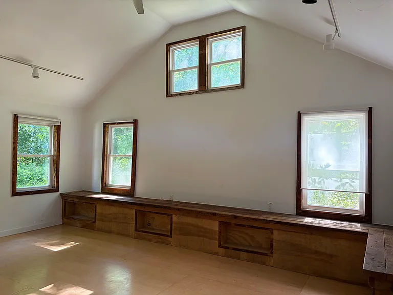 Detached, bright studio.